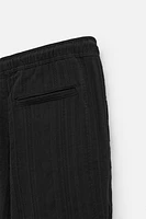 TEXTURED RELAXED FIT PANTS