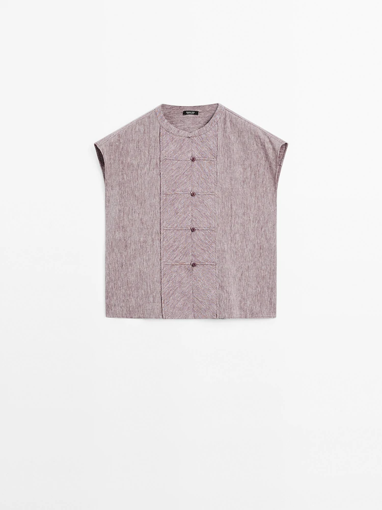 Flowing blouse with bib detail