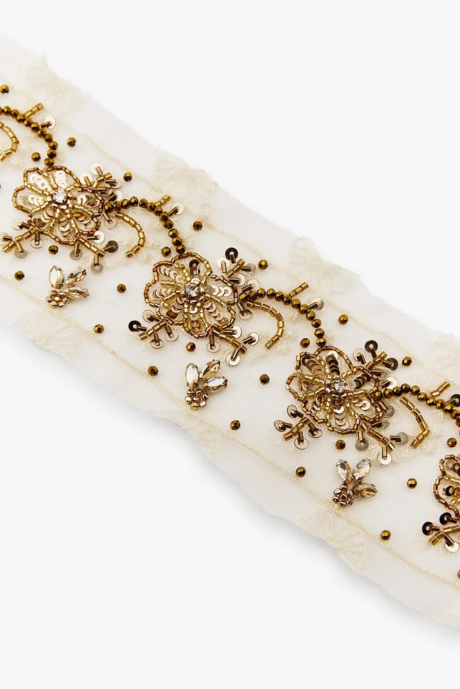 ACCESSOIRE MULTIPOSITION BRODERIES FANTAISIE ÉDITION LIMITÉE