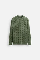 WASHED CABLE-KNIT SWEATER