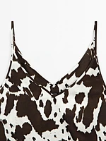 Flowing strappy animal print top
