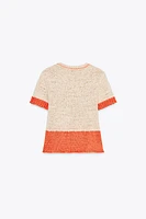 TOP EN MAILLE MANCHES COURTES