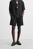 SHORT EN JACQUARD GÉOMÉTRIQUE