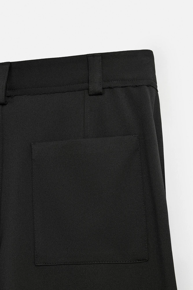 TEXTURED PLEATED SHORTS