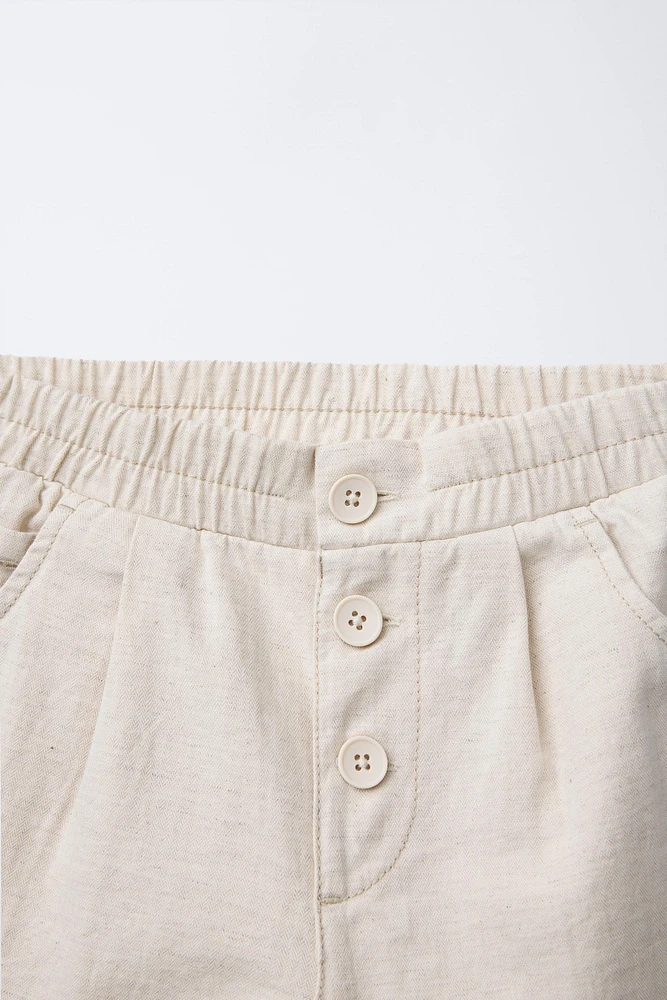 PANTALON BAGGY À BOUTONS EN LIN