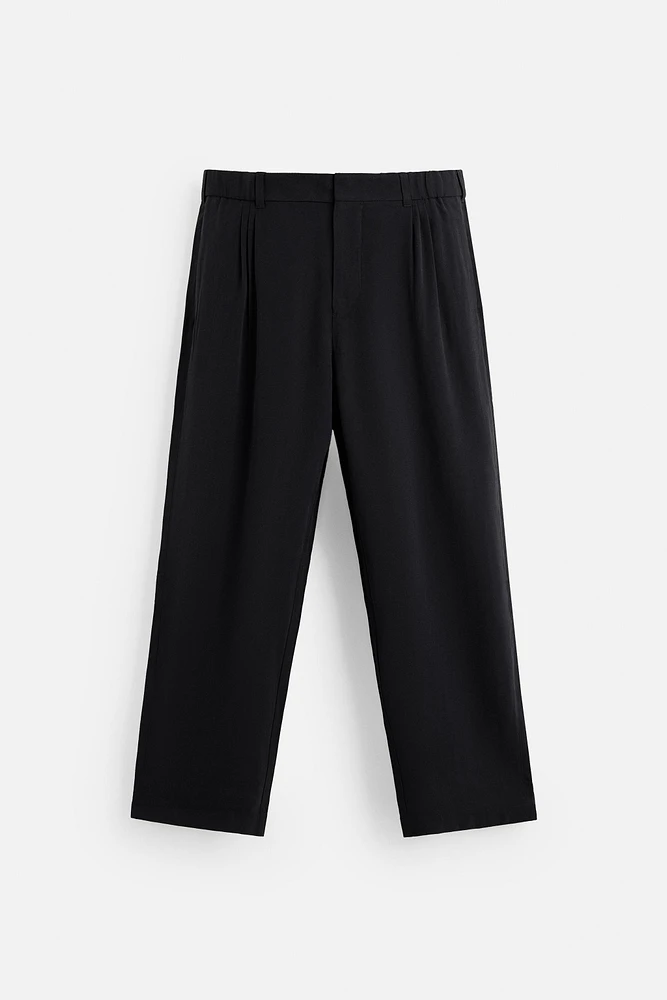 FLOWY PLEATED PANTS