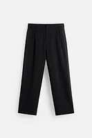 FLOWY PLEATED PANTS