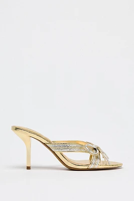 METALLIC BOW HEELED SANDALS