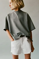 SHORT EN DENIM DÉCHIRÉ
