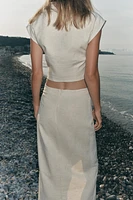 BUCKLE MIDI SKIRT