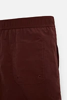 DRAWSTRING SWIM TRUNKS