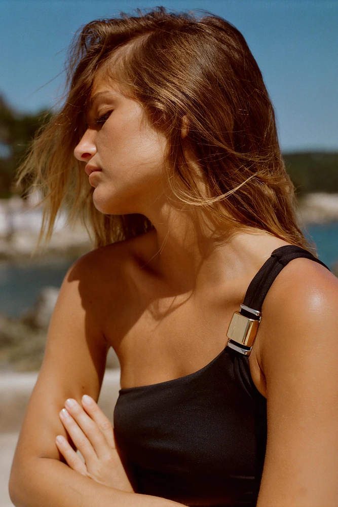 ASYMMETRIC CUT-OUT SWIMSUIT WITH SHOULDER DETAIL