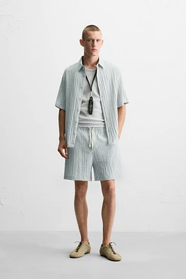 WRINKLED EFFECT JACQUARD BERMUDA SHORTS