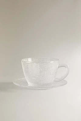 GLASS TEACUP WITH RAISED DESIGN