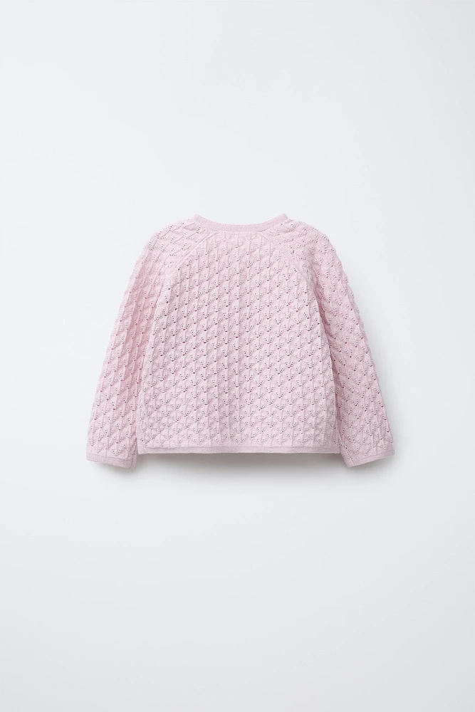 GILET EN MAILLE AJOURÉE