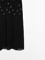Robe longue avec perles fantaisie