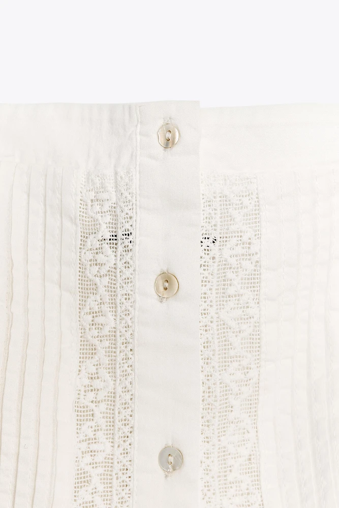 DRAPED EMBROIDERED TOP