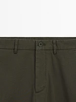 Cotton blend textured slim fit trousers