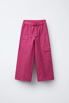 PANTALON JAMBES LARGES EN MATIÈRES VARIÉES AVEC POCHES