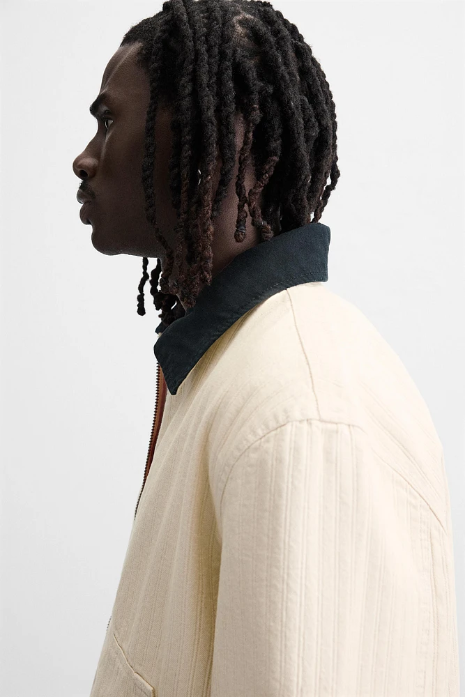 BLOUSON AVEC COL BIMATIÈRE