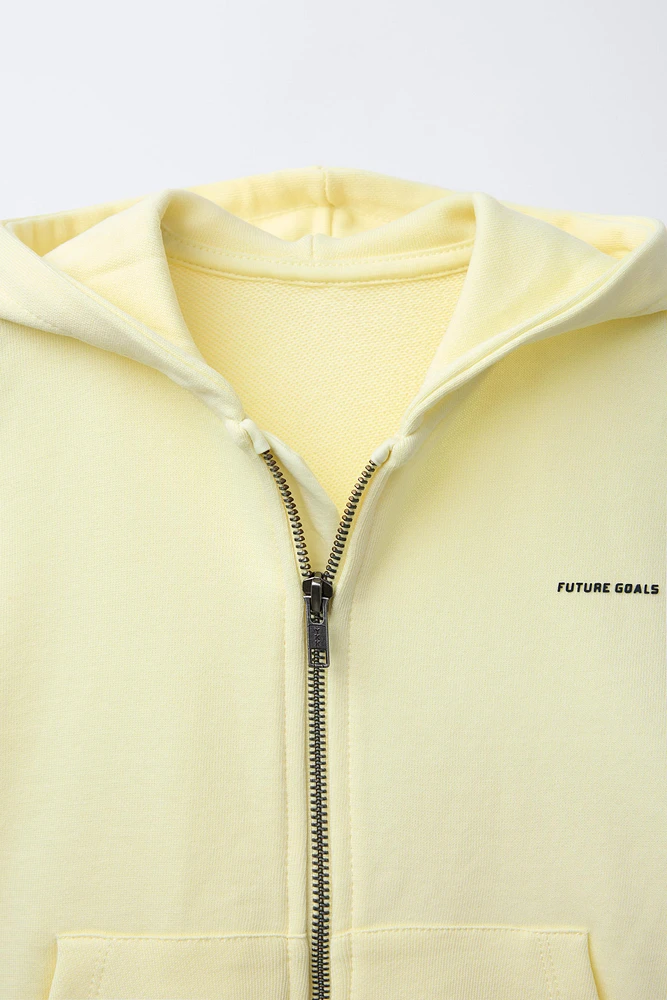 HOODED SWEATSHIRT WITH RAISED TEXT