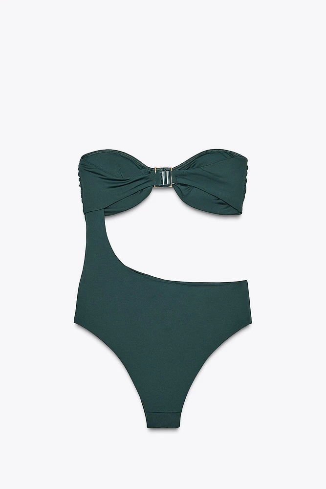 MAILLOT DE BAIN CUT OUT AVEC PIÈCE MÉTALLIQUE