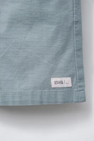 BERMUDA EN COTON COUPE AMPLE ÉTIQUETTE