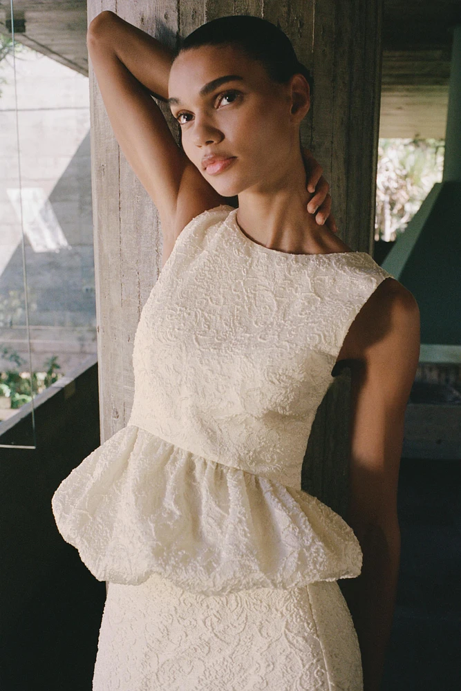 TEXTURED PEPLUM TOP