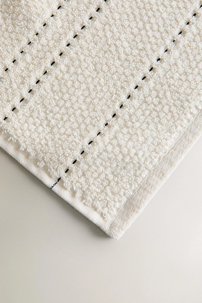 SERVIETTE DE BAIN POINT RIZ SURPIQÛRE