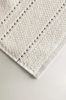 SERVIETTE DE BAIN POINT RIZ SURPIQÛRE