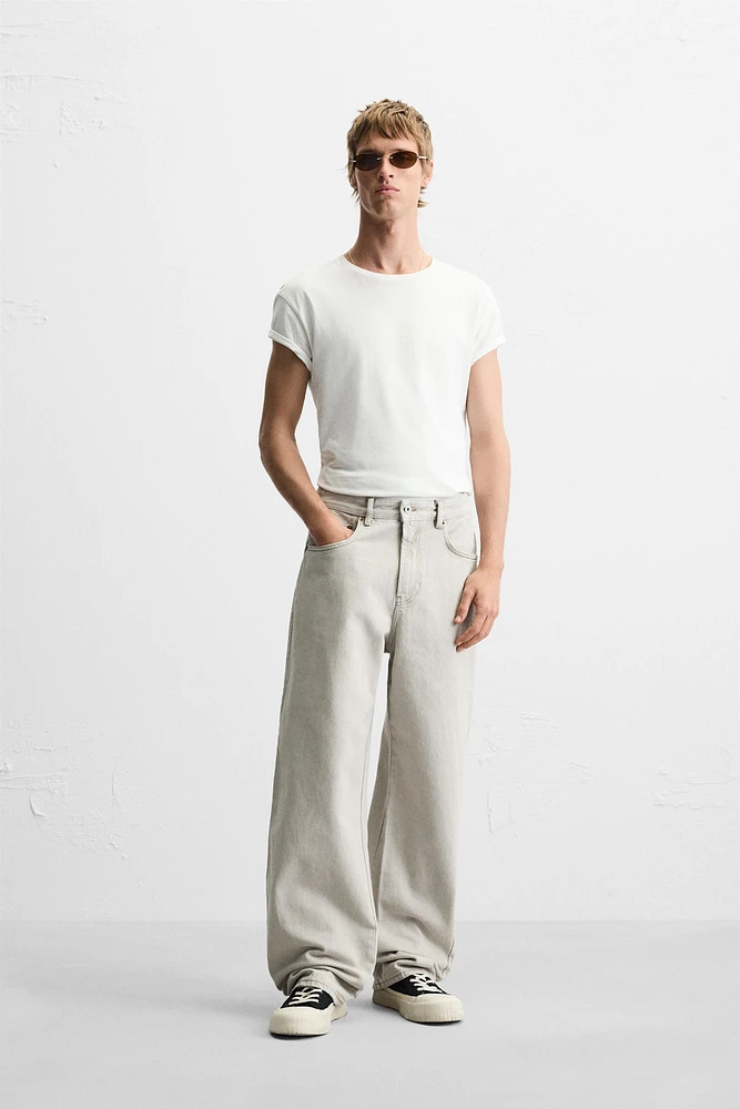 JEAN BAGGY À COUTURES ASYMÉTRIQUES