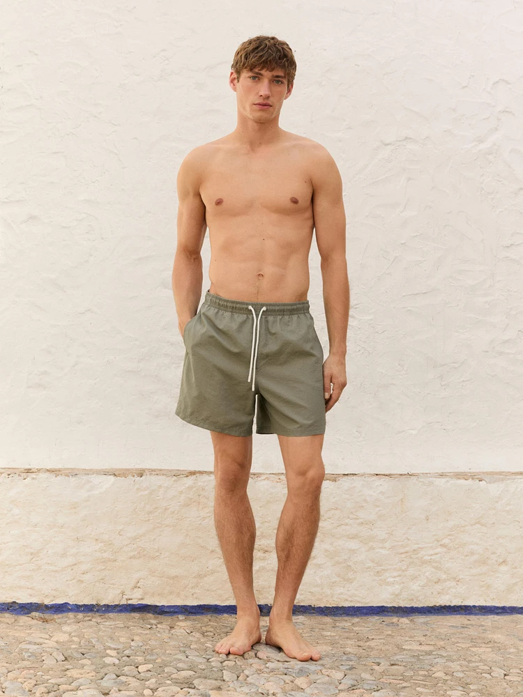 Plain regular fit swimming trunks