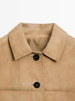 Veste courte à surpiqûres en cuir effet daim