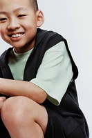 GILET À CAPUCHE SPORT