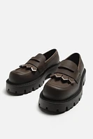 MOCASSIN À SEMELLE ÉPAISSE AVEC FRANGES