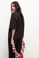 ZIP POLO COLLAR TOP