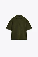 ZIP POLO COLLAR TOP