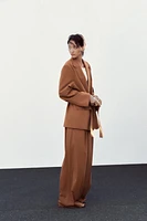 VESTE OVERSIZE À CEINTURE