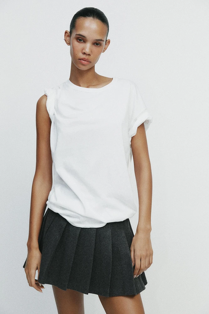 PLEATED MINI SKIRT