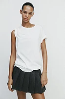 PLEATED MINI SKIRT