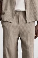 TEXTURED RELAXED FIT PANTS