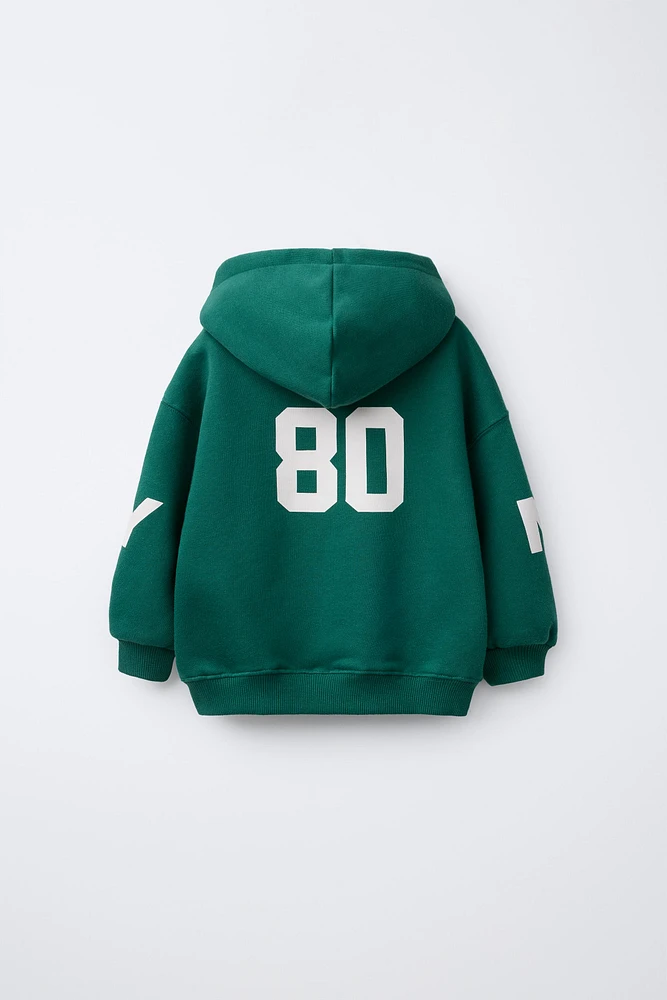 SWEAT À CAPUCHE IMPRIMÉ
