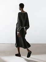 Cape blouse with batwing sleeves