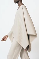 ASYMMETRIC RIBBED CAPE