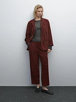 Low-rise cropped suede leather trousers