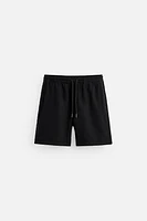 TEXTURED REGULAR FIT SHORTS