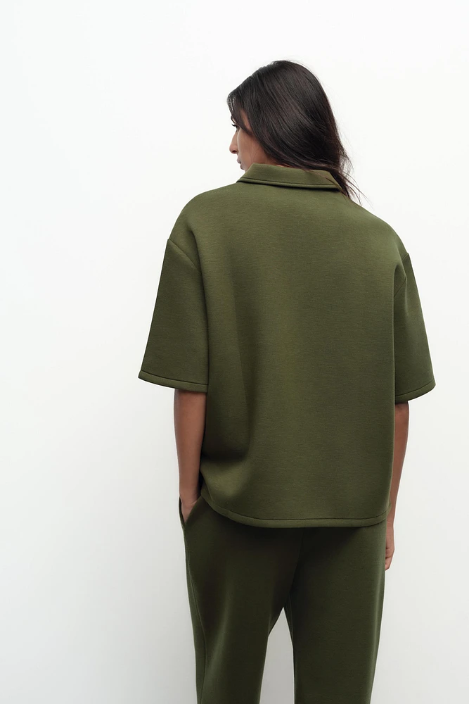 ZIP POLO COLLAR TOP