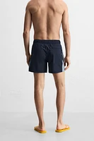 CONTRAST BANDS MID-LENGTH SWIMSUIT