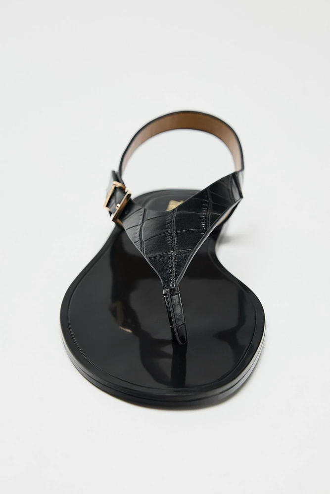 EMBOSSED FLAT SANDALS