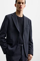 TEXTURED SUIT BLAZER